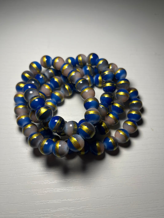 Light blue with gold beaded bracelets