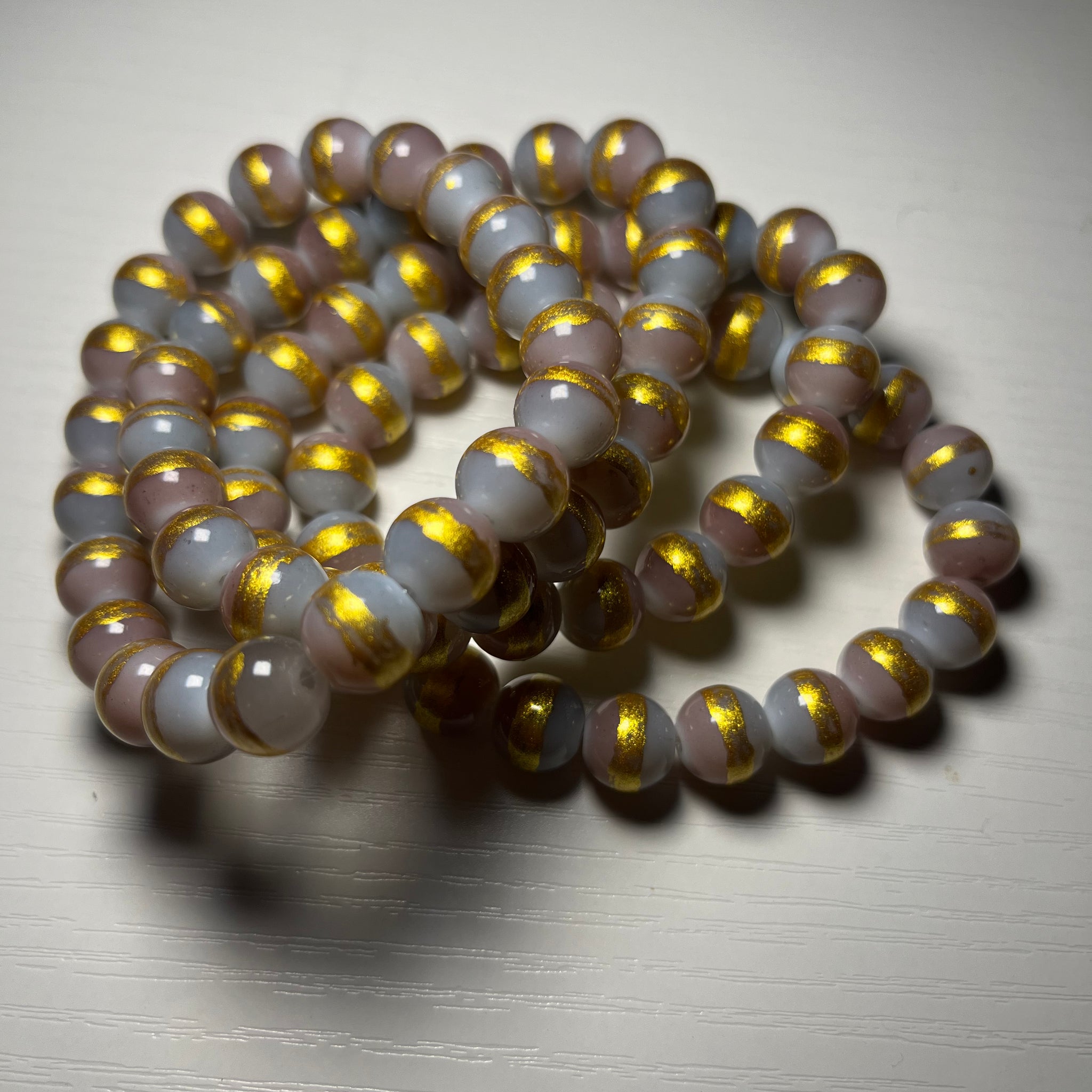 Gold stripe beaded bracelets 