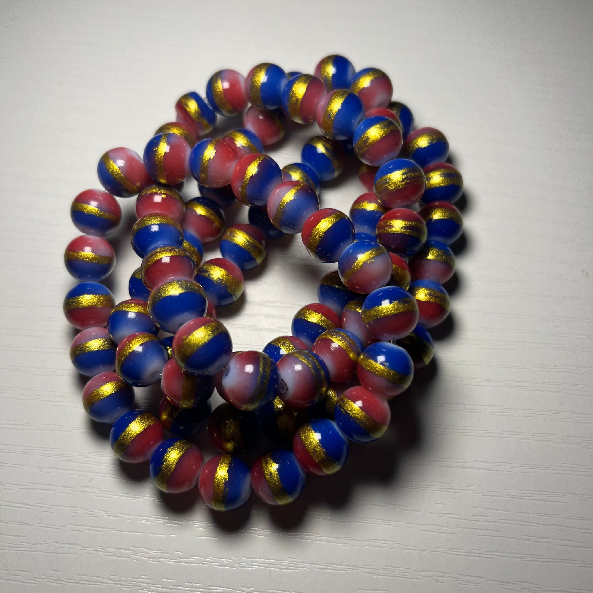 Blue and red Beaded bracelets with gold