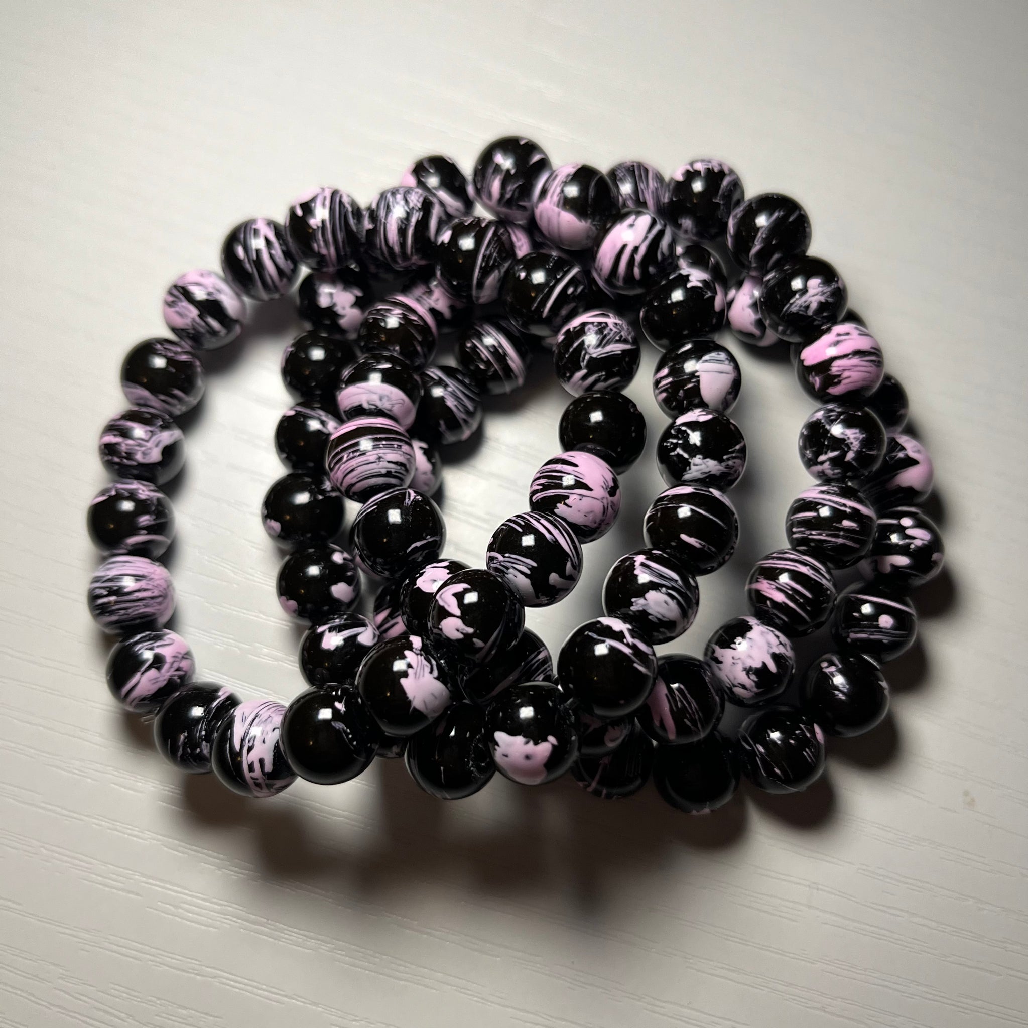 Black and pink beaded bracelets