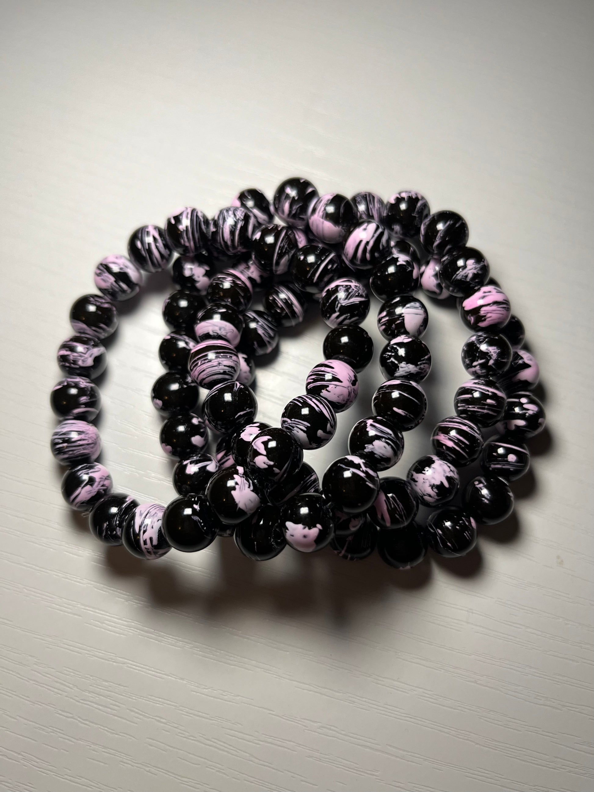 Black and pink beaded bracelets