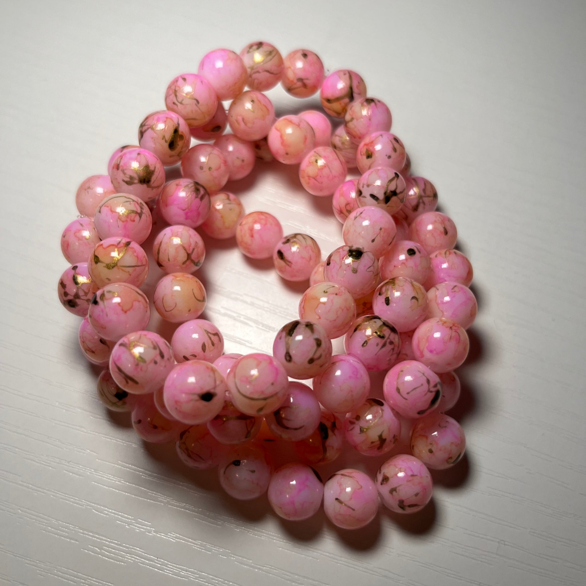 Pink bracelets with splash of black 