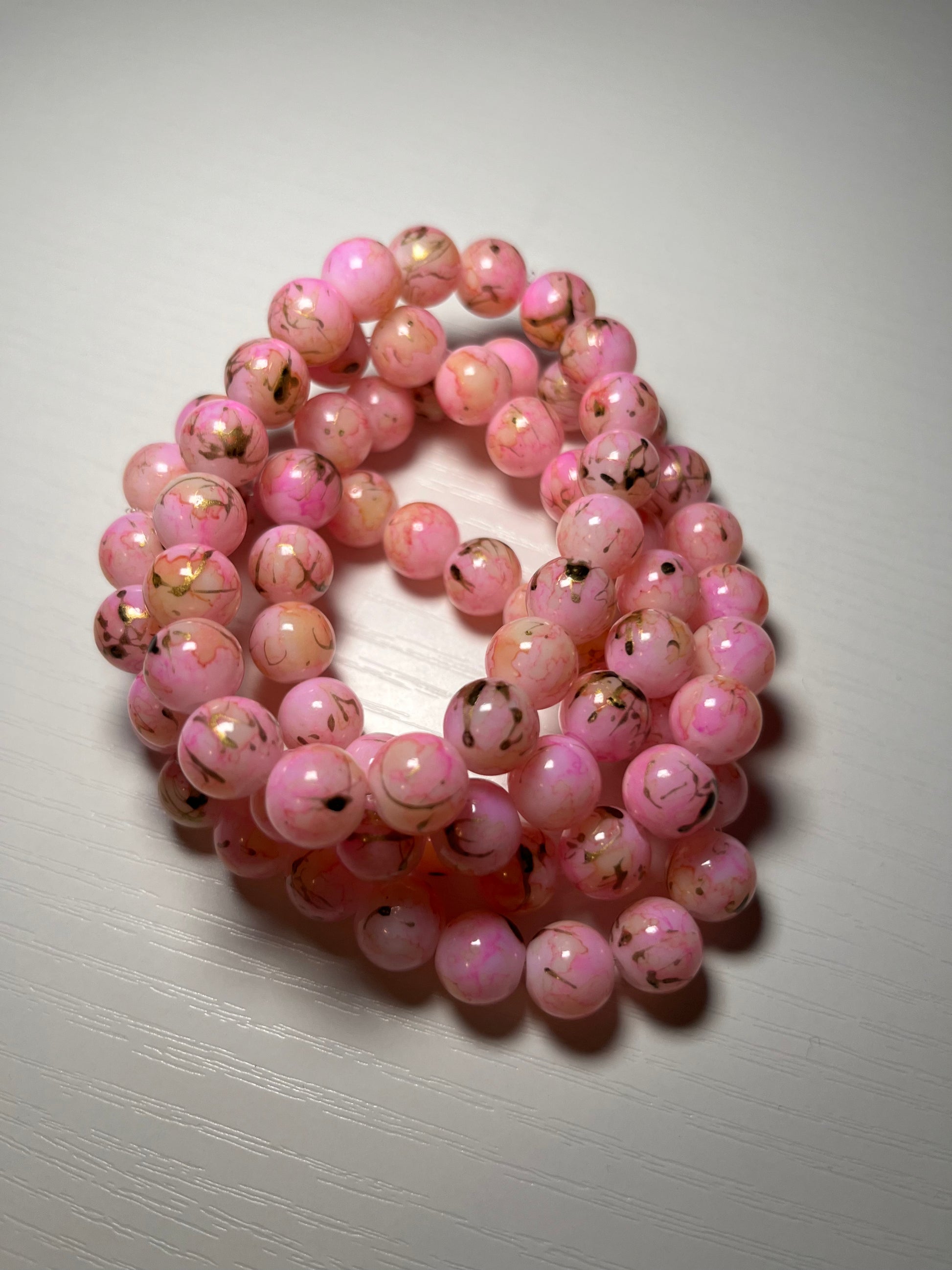 Pink bracelets with splash of black 