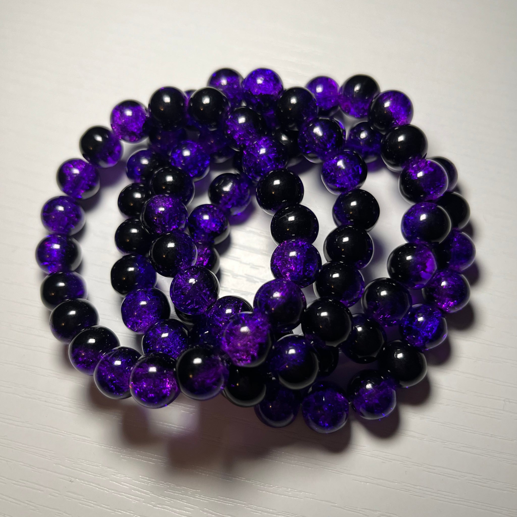 Purple and black beaded bracelet 