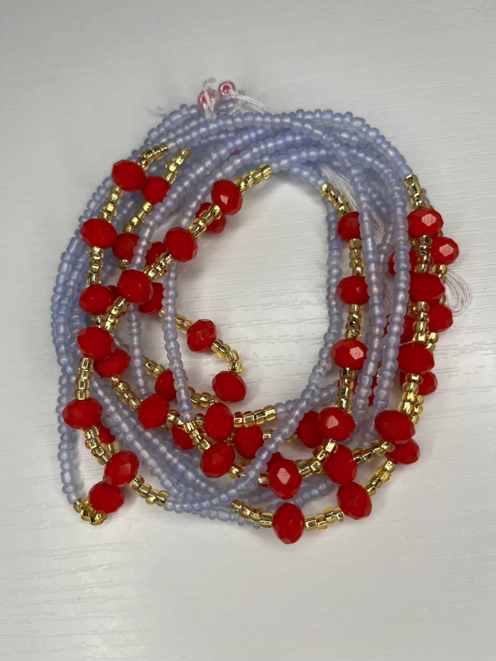 Blue waistbeads with gold and red crystals 