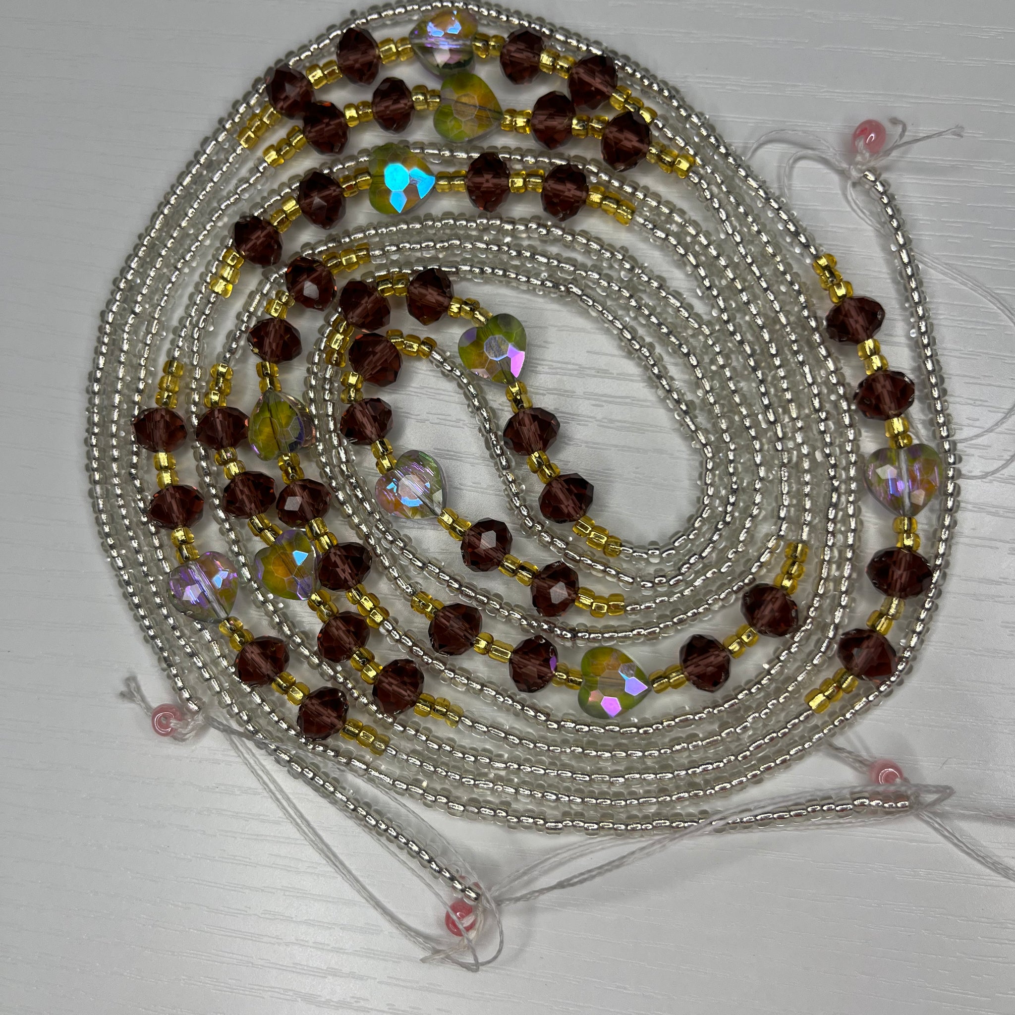 Clear waistbeads with brown crystals and hearts