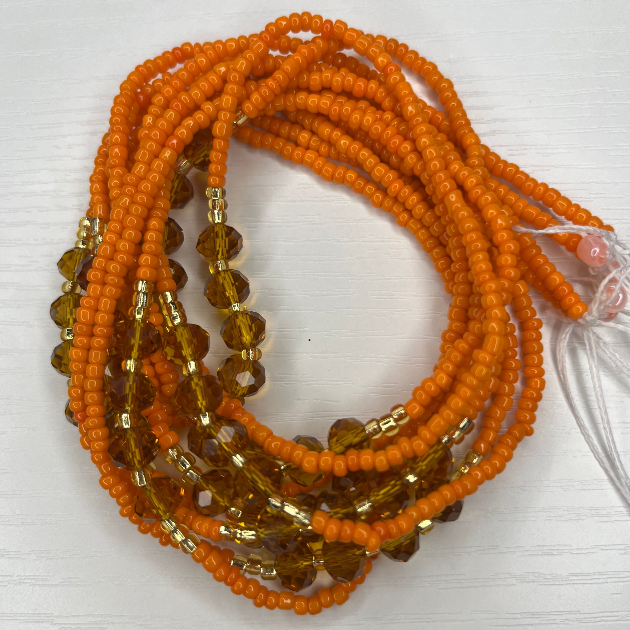 Orange with gold and brown waistbeads