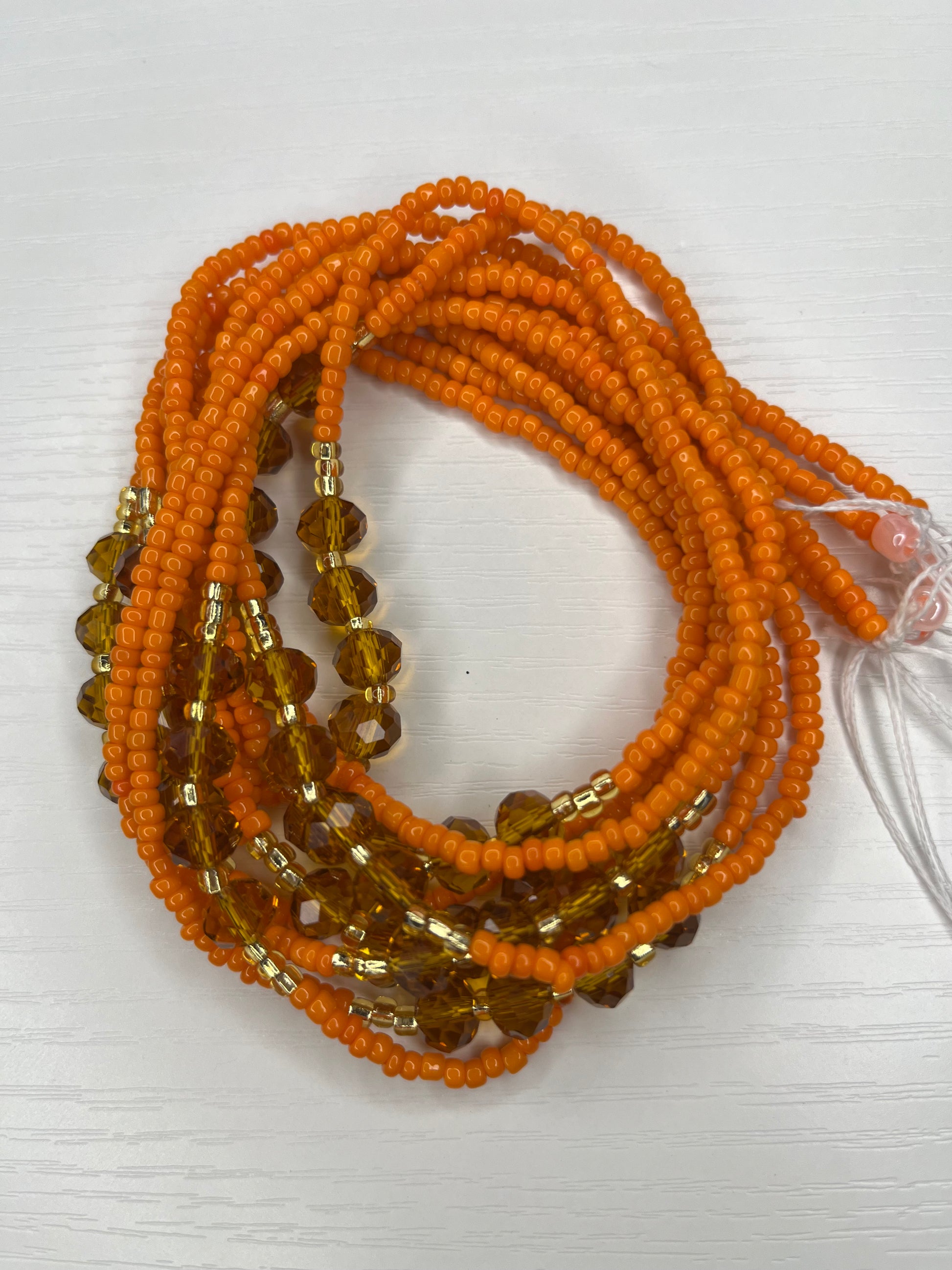 Orange with gold and brown waistbeads