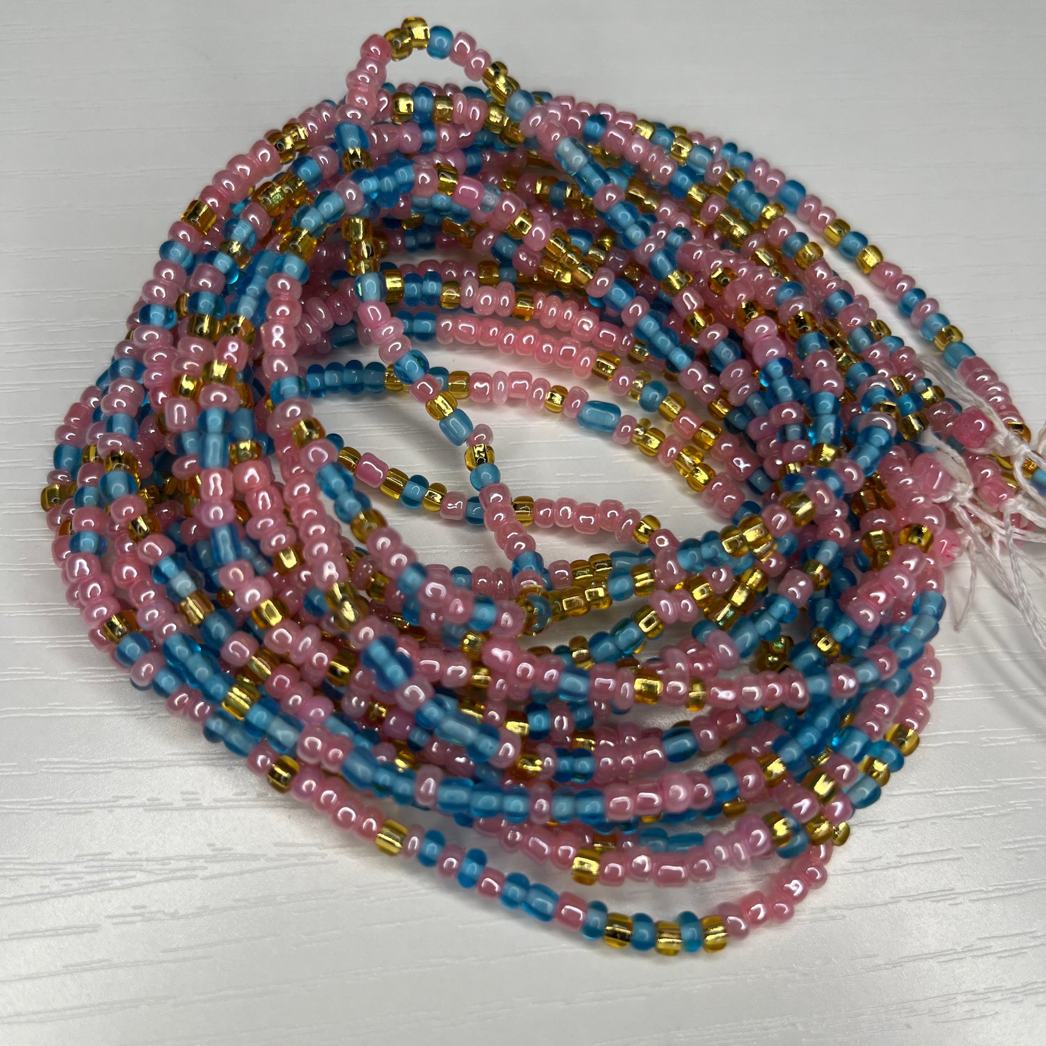 Pink blue and gold waistbeads