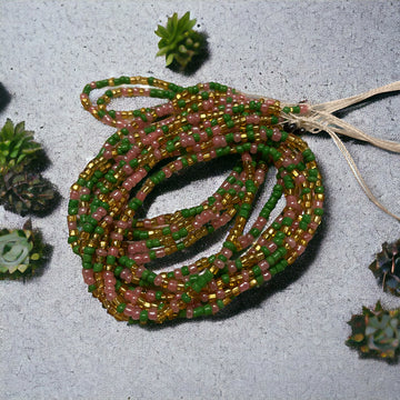 pink green and gold belly beads